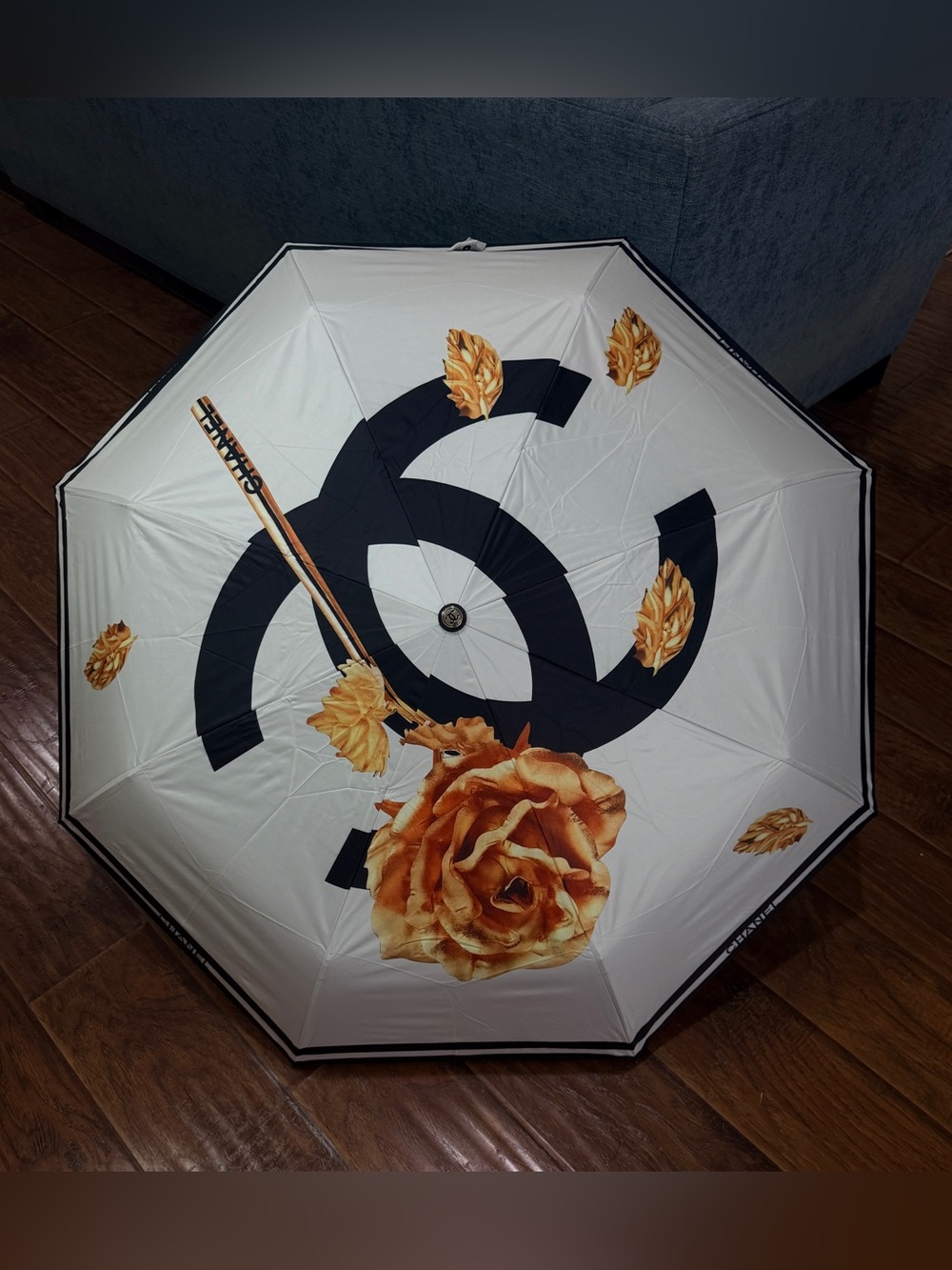 Chanel umbrella cream
signature CC Vintage Floral
design NIP W/slip pocket